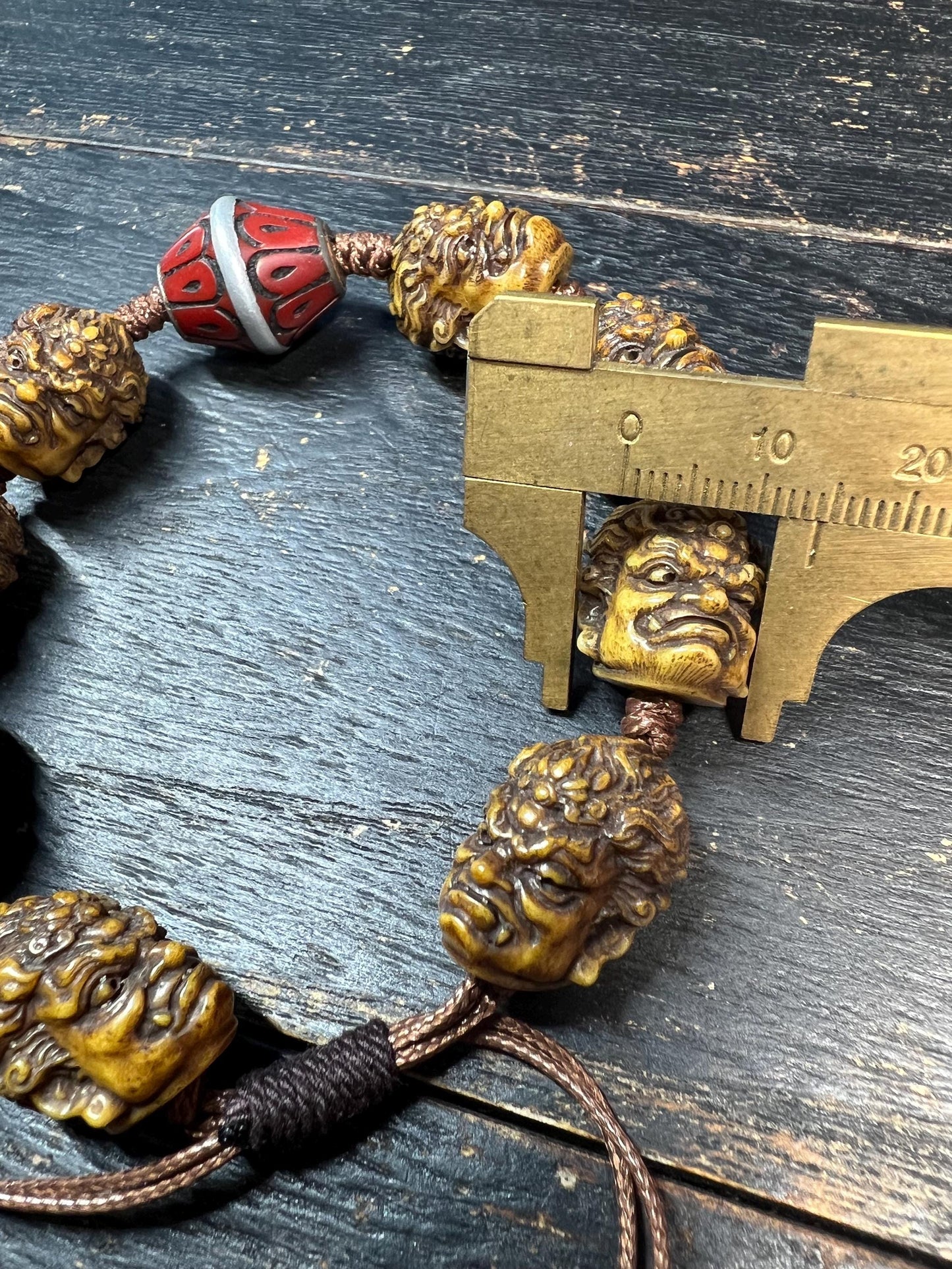 Tibetan Yak Bone Mahakala Bracelet with Coral Inlay Guru Bead | Hand‑Carved Skull Deity Heads