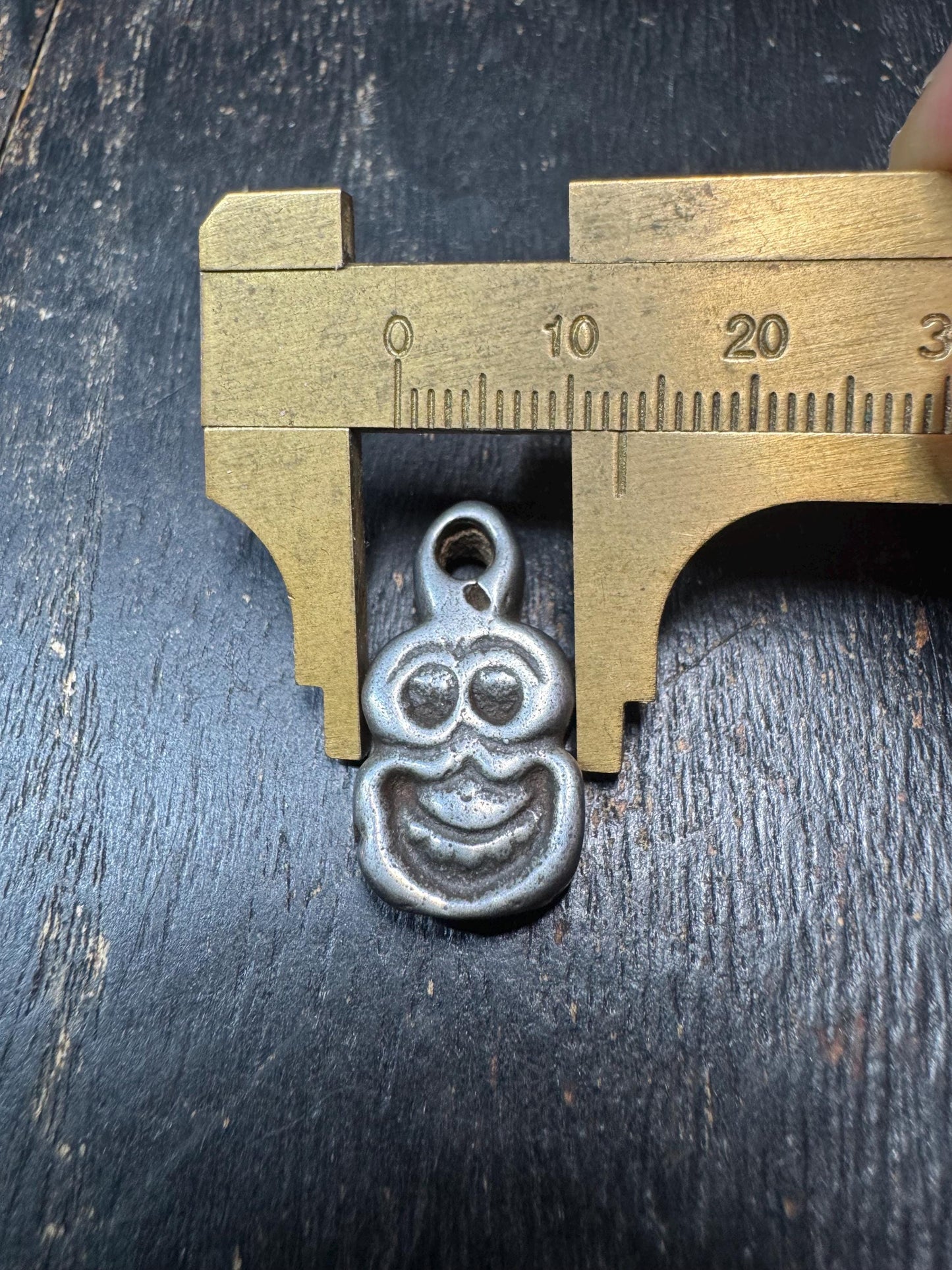Nepalese Iron Skull Charm - Vajrayana Dharma Amulet for Spiritual Protection