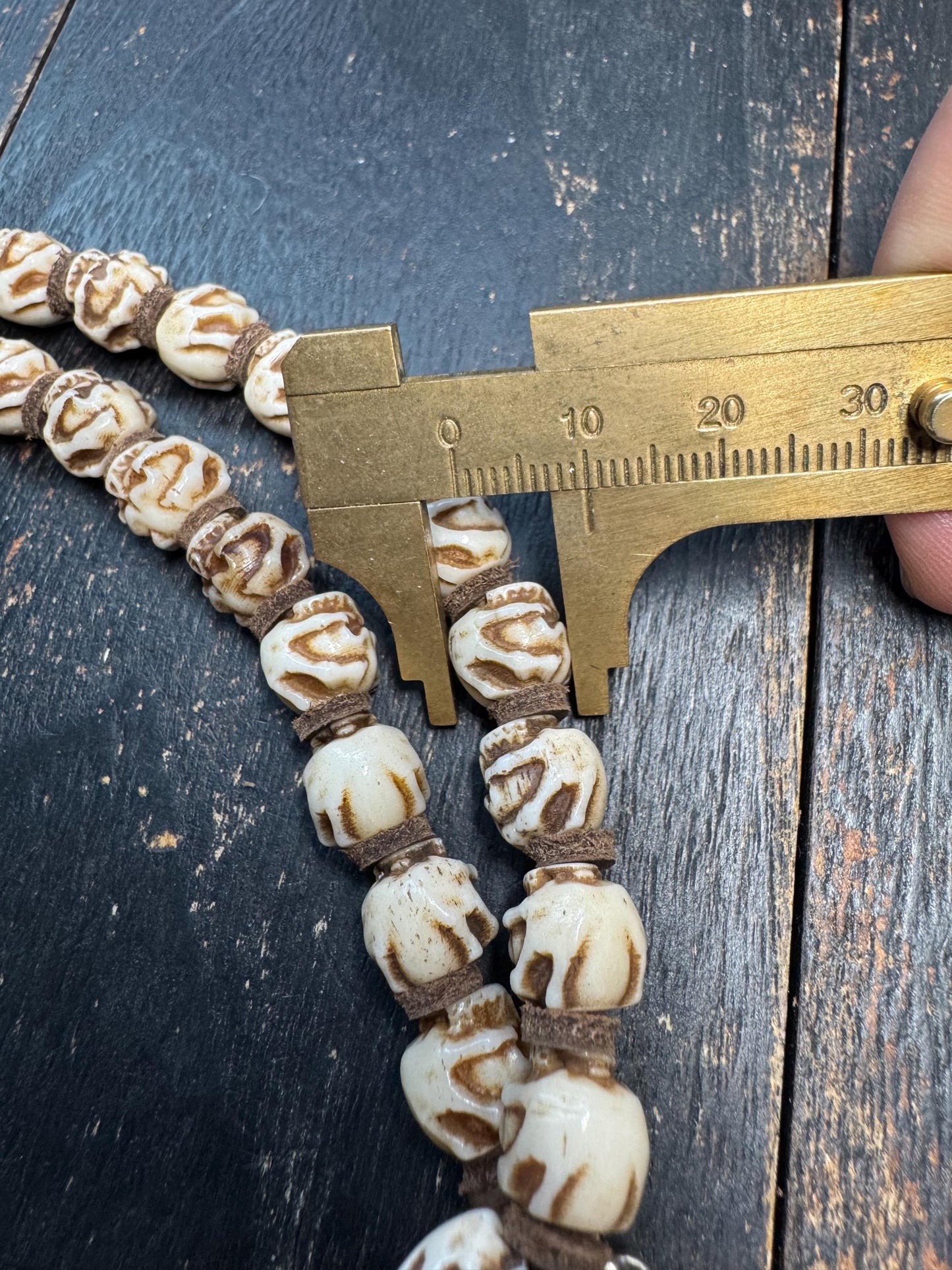 54 Bead Yak Bone Skull Mala – Hand Carved Chitipati Style Bone Necklace – 24 Inch Tibetan Inspired Meditation Mala – Sheepskin Spacers –