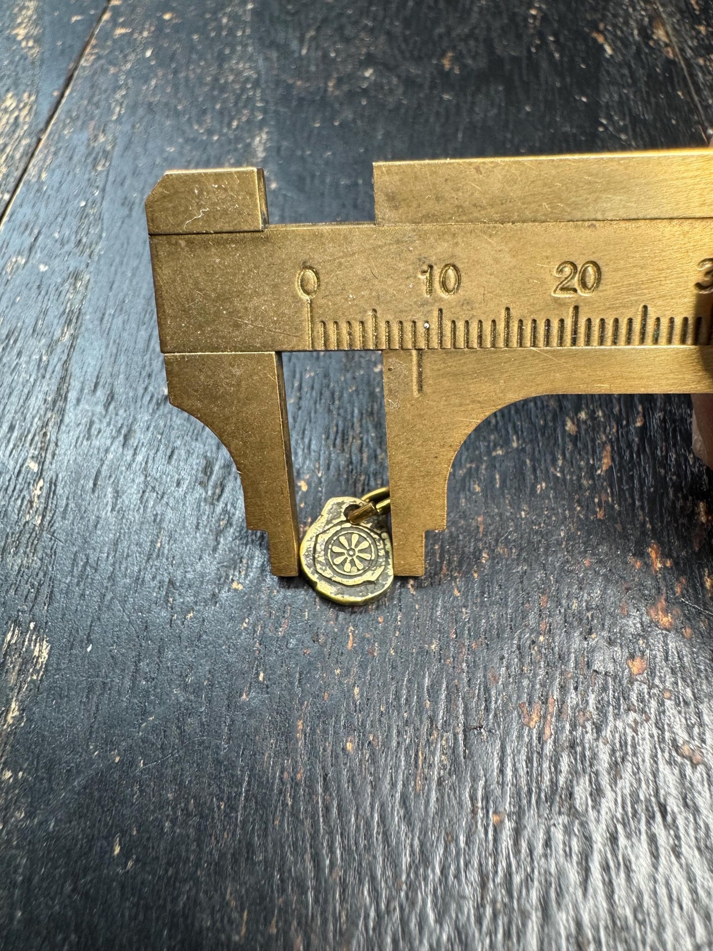 Mini Tibetan Brass Dharma Wheel Pendant – Double Sided Buddha Charm – Antique Style Small Spiritual Amulet