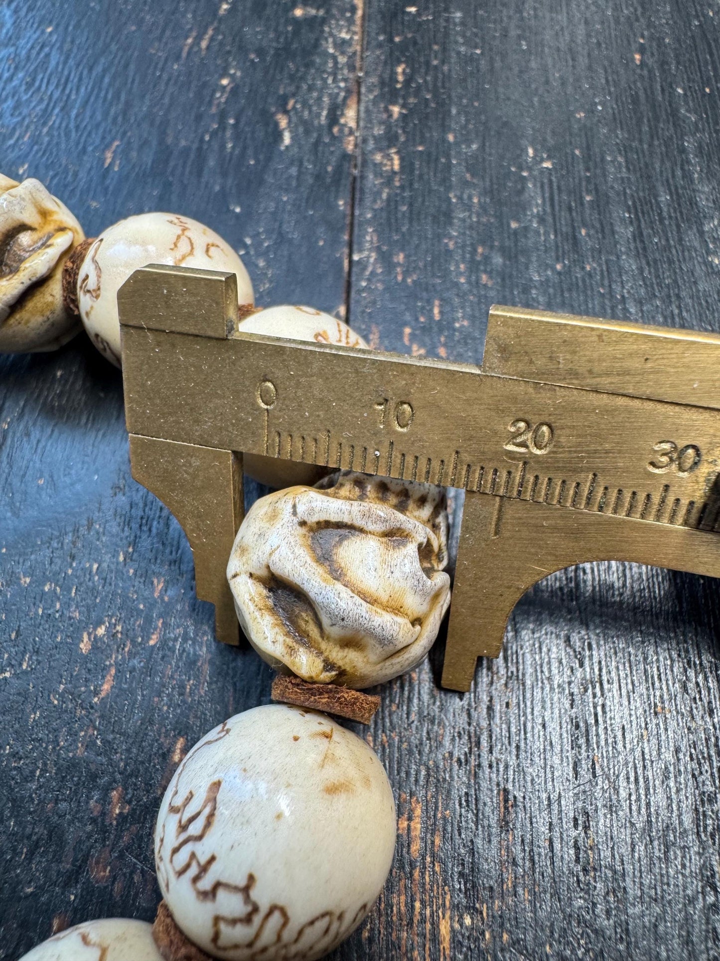 Hand Carved Deer Antler Skull Bracelet | Rustic Bone Bead Bracelet | Artisan Carved Beads | Adjustable Stretch Bracelet | One of a Kind