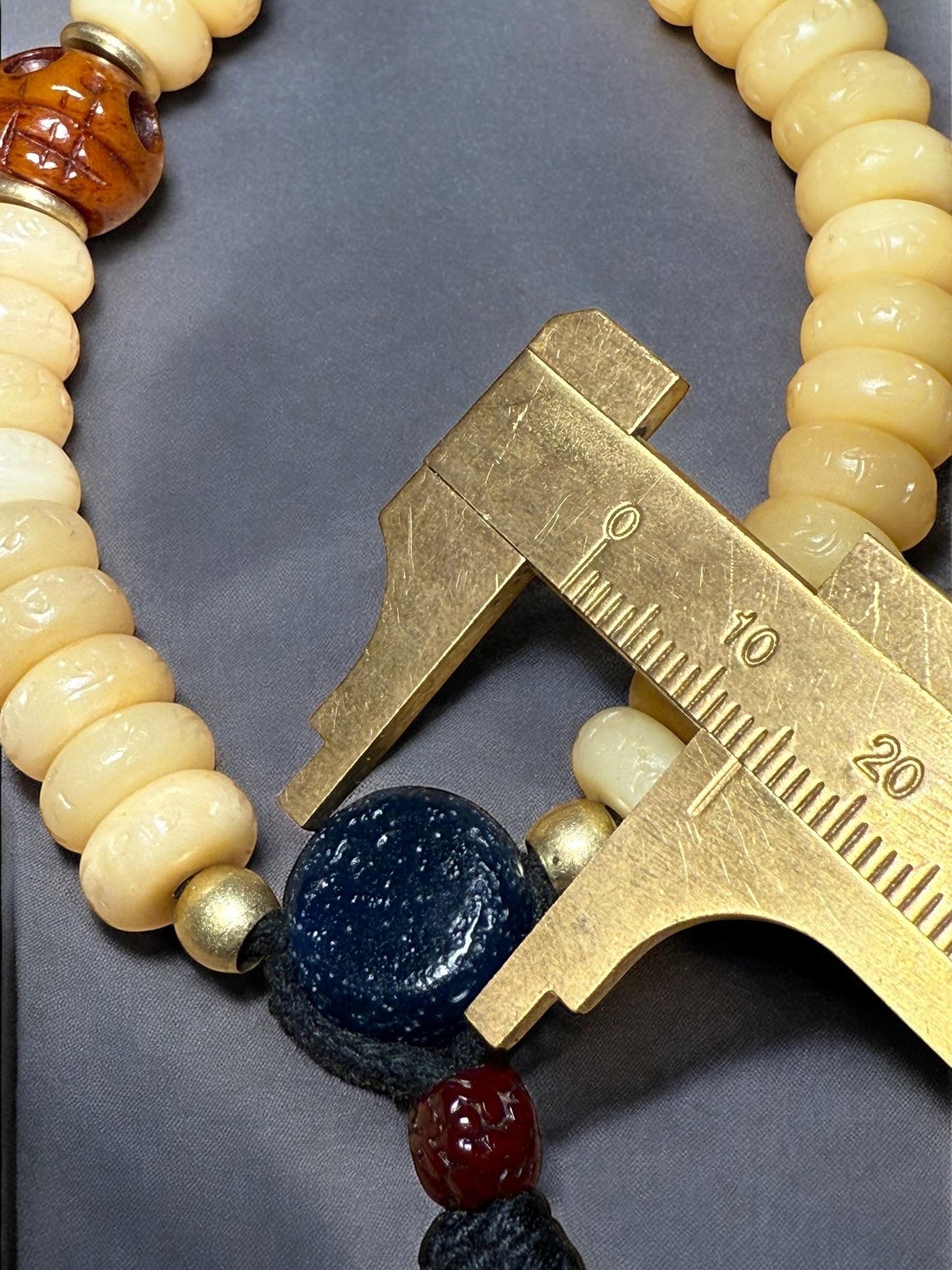 Tibetan Yak Bone Wrist Mala: Om Mani Mantra, Agate & Citipati Skull
