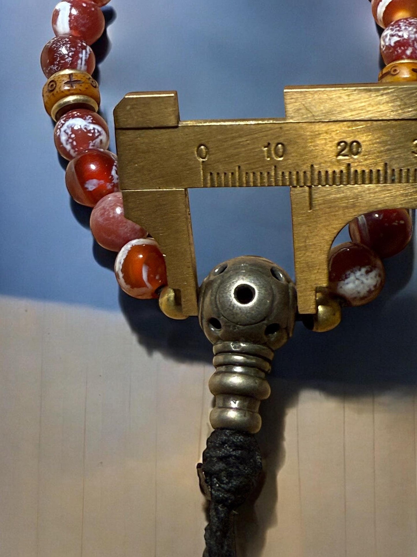 Handcrafted Tibetan wrist mala is made with natural agate bead