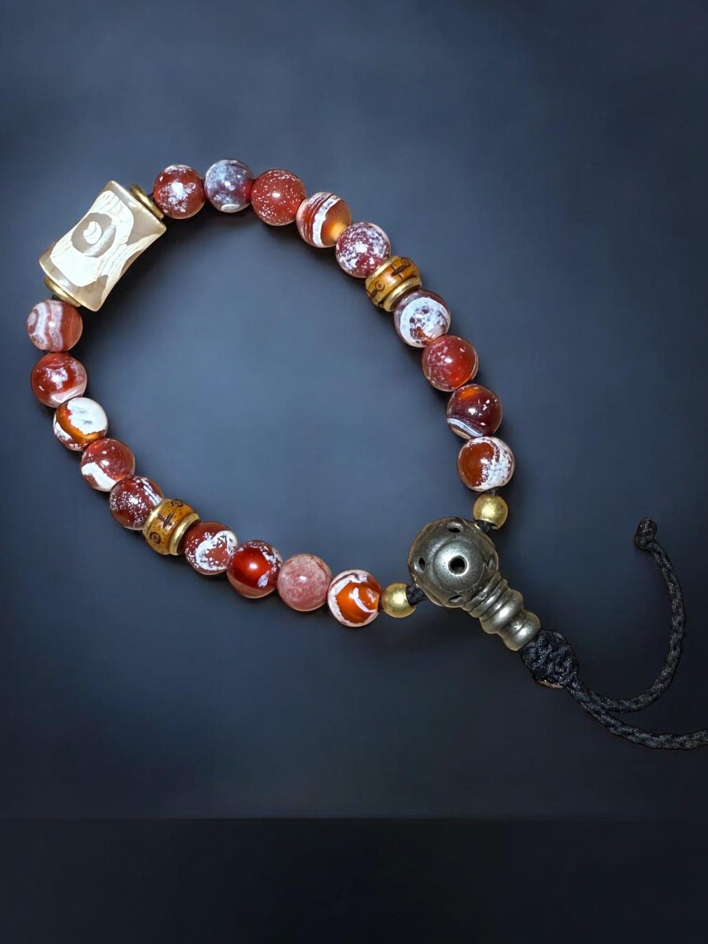 Handcrafted Tibetan wrist mala is made with natural agate bead