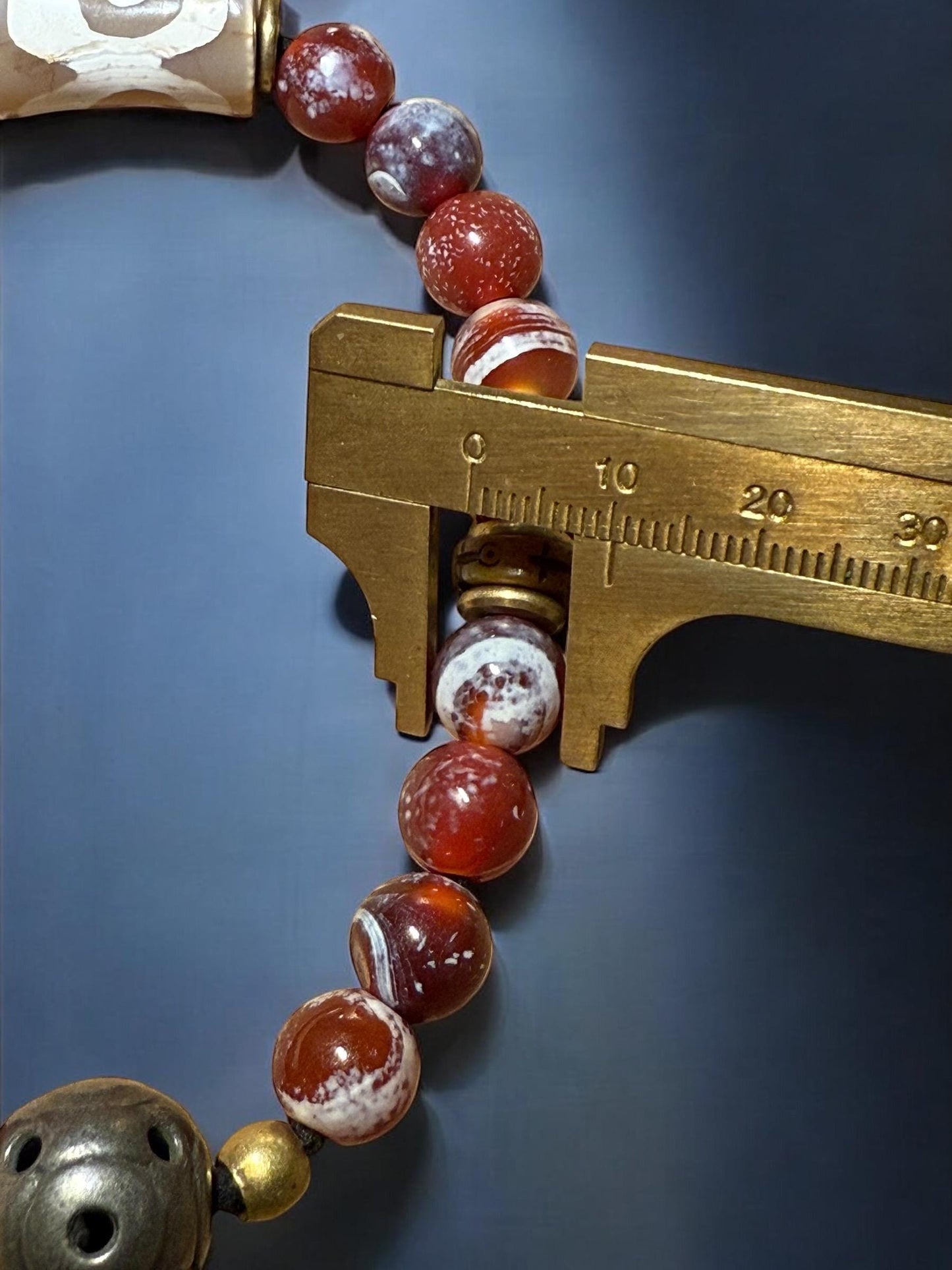 Handcrafted Tibetan wrist mala is made with natural agate bead