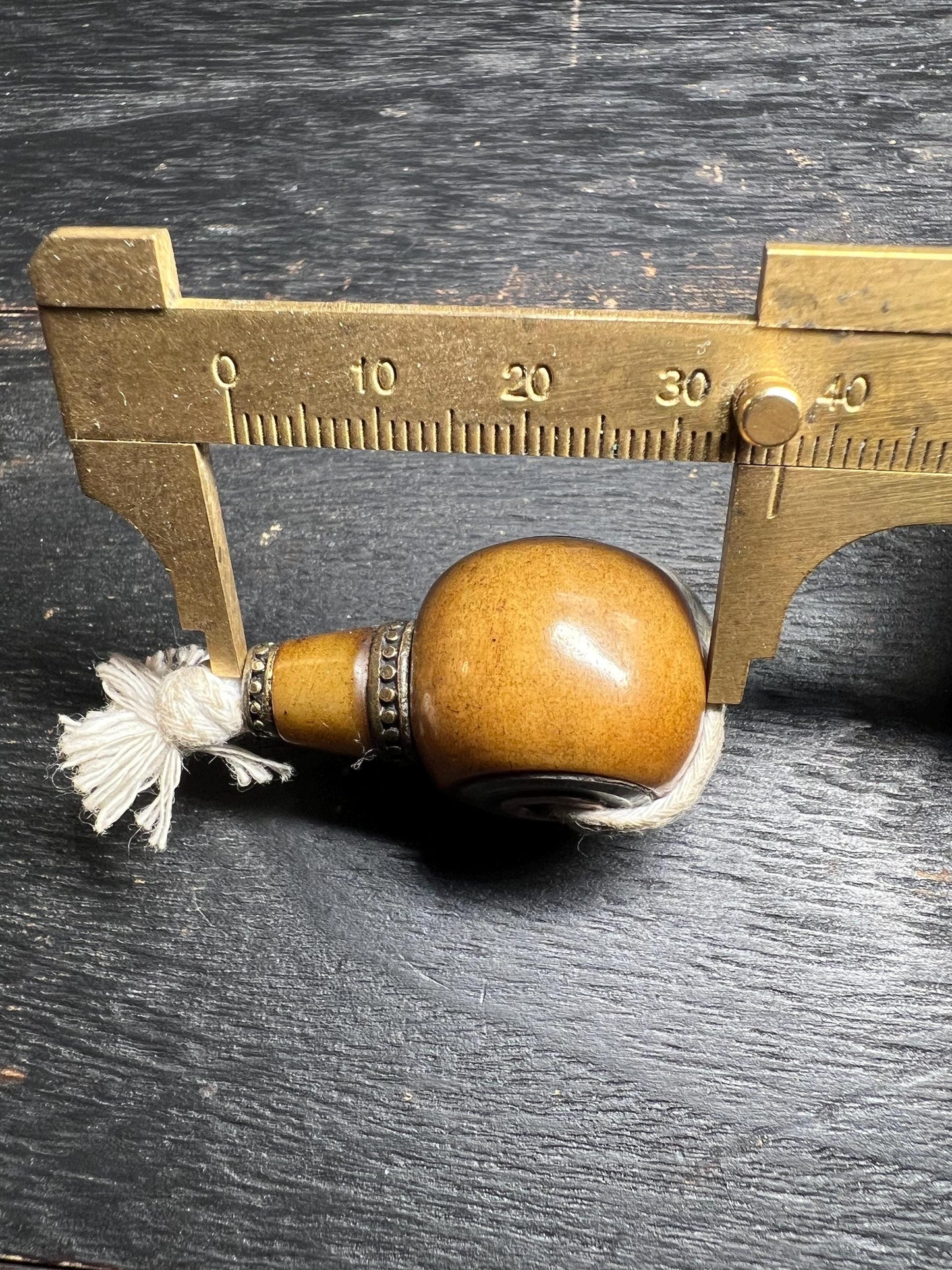 Hand-Carved Yak Bone Guru Bead: Tibetan Mala Component with Tassel