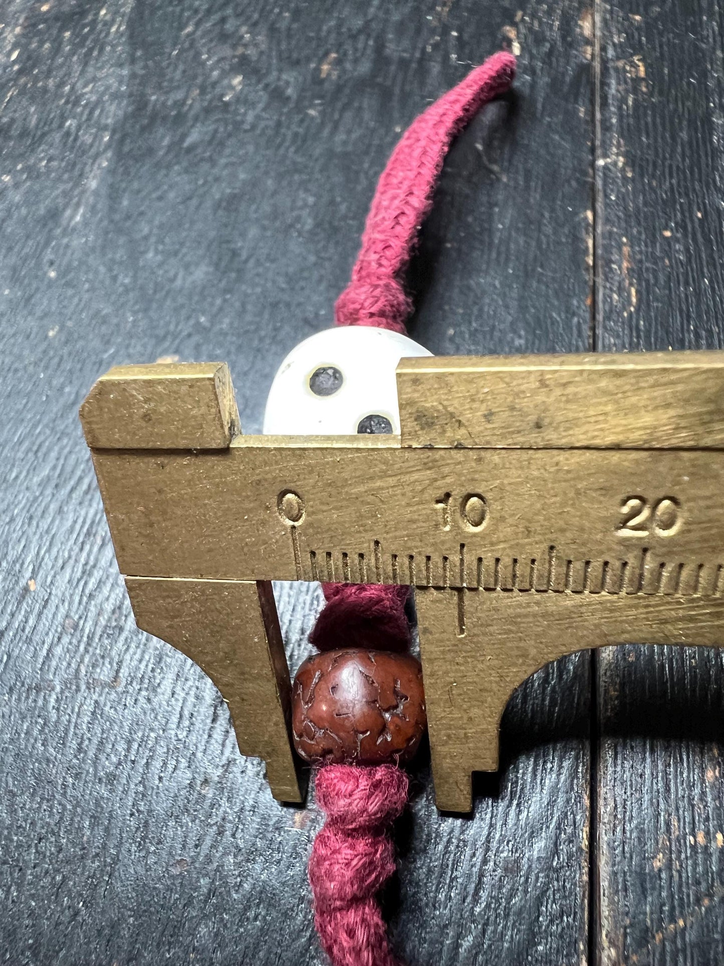 Tibetan Conch Shell Dice Amulet: Carved Face Bead, Bodhi Seed Talisman
