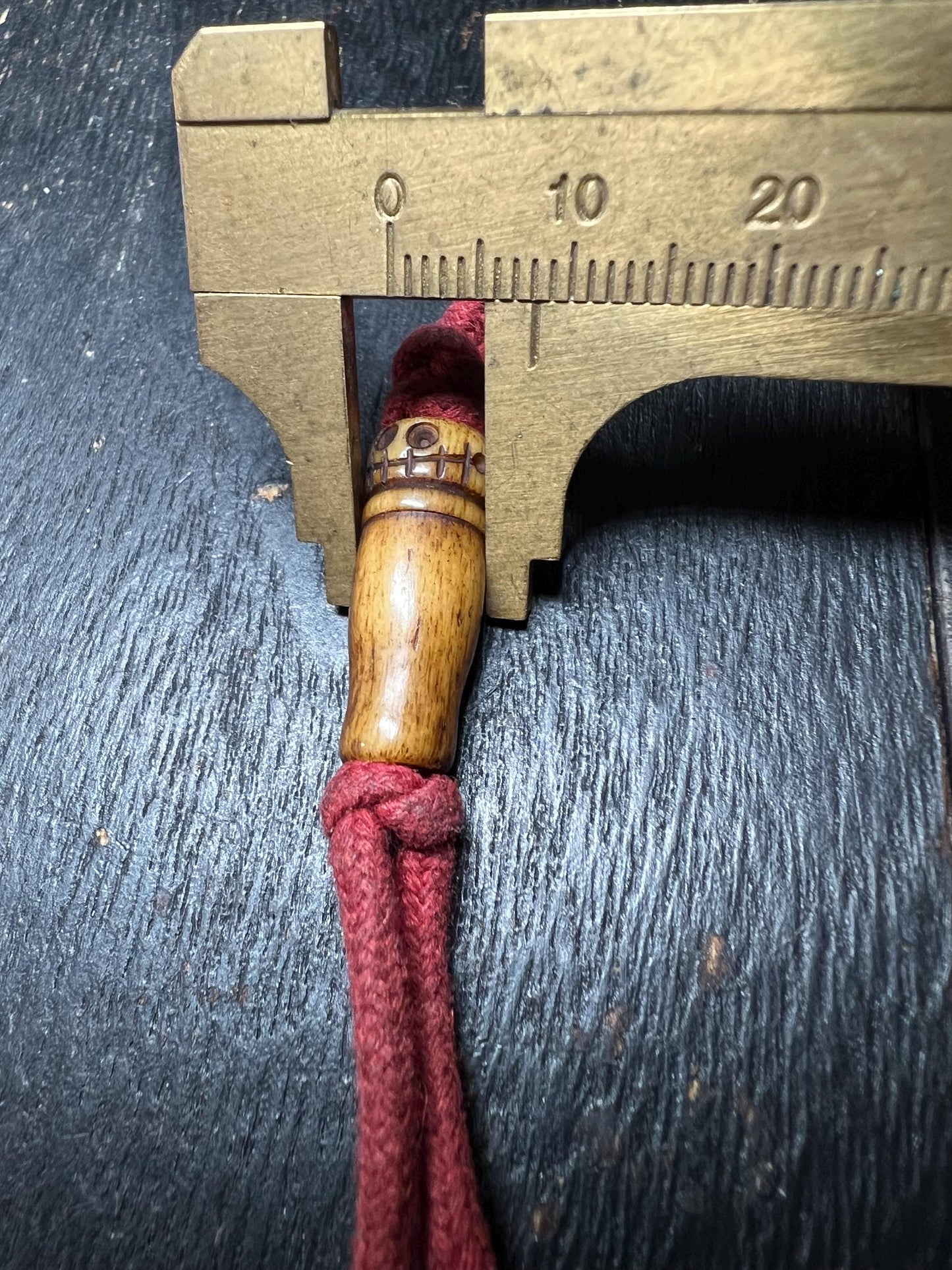 Hand-Carved Yak Bone Pendant with Red Tassel | Tibetan Amulet Charm | Spiritual Keychain or Mala Accessory