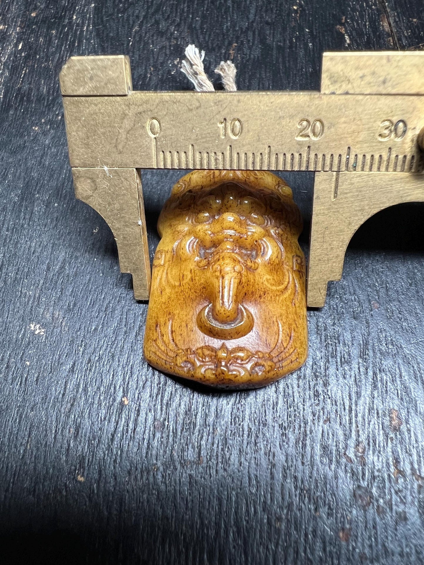 Tibetan Yak Bone Amulet – Hand-Carved Guardian Lion Face Pendant for Protection