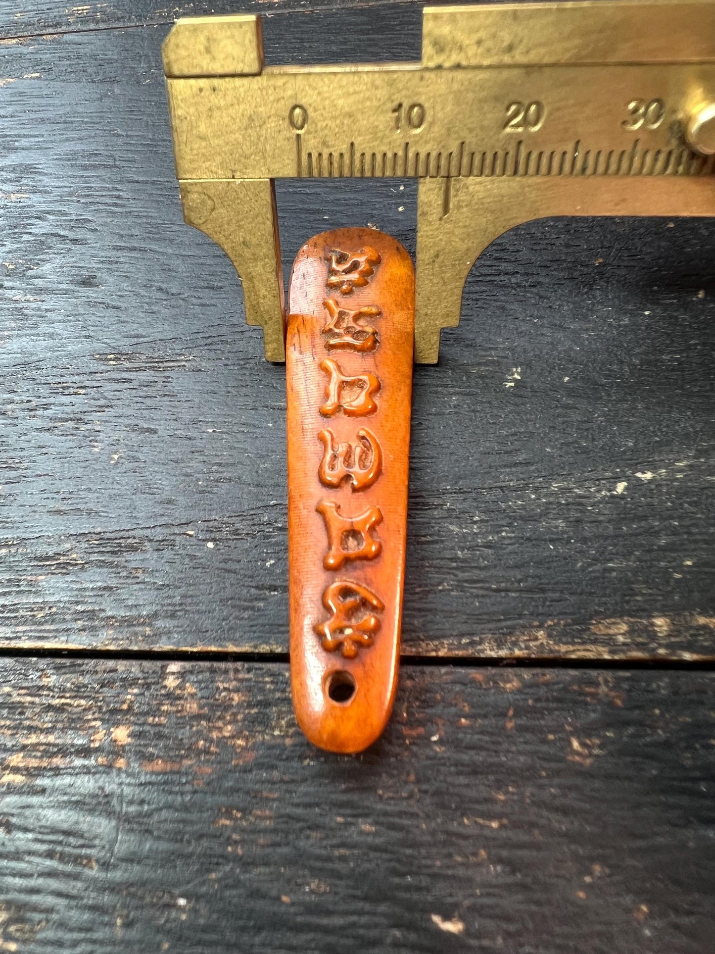 Tibetan Yak Bone Pendant – Hand-Carved Six-Syllable Mantra (“Om Mani Padme Hum”)