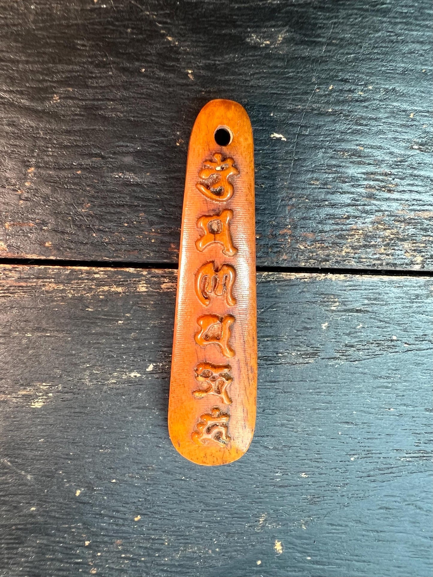 Tibetan Yak Bone Pendant – Hand-Carved Six-Syllable Mantra (“Om Mani Padme Hum”)