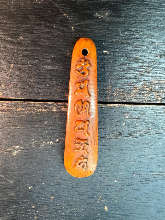 Tibetan Yak Bone Pendant – Hand-Carved Six-Syllable Mantra (“Om Mani Padme Hum”)