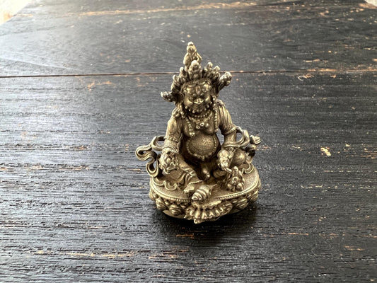 Tibetan Dzambhala Wealth Deity Statue – White Metal Miniature Buddhist Prosperity God, 33mm
