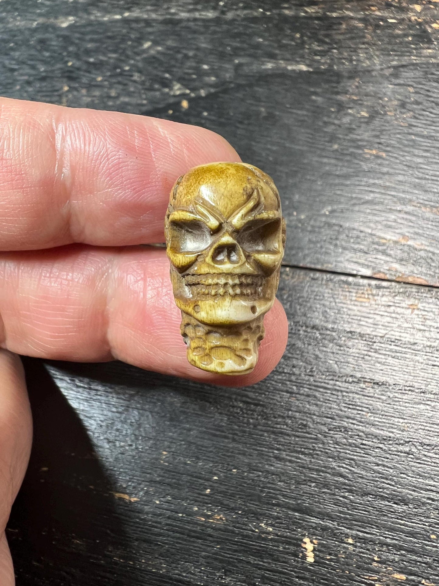 Hand-Carved Deer Antler Citipati Skull Bead with Grasping Bone Hand, Tibetan Charnel Ground Focal Pendant, Vertical Drill