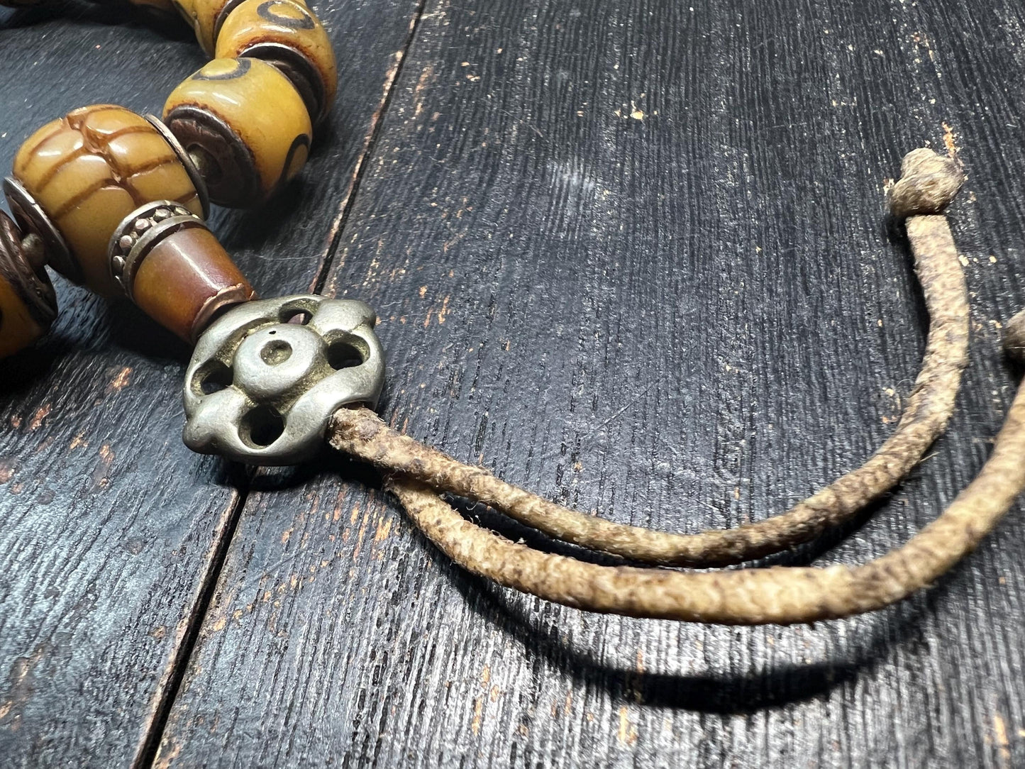 Adjustable Yak Bone Mantra Dot Mala Bracelet | Devouring Guru Bead | Tibetan Buddhist Amulet | Leather Cord & White Copper Accents | Under 8