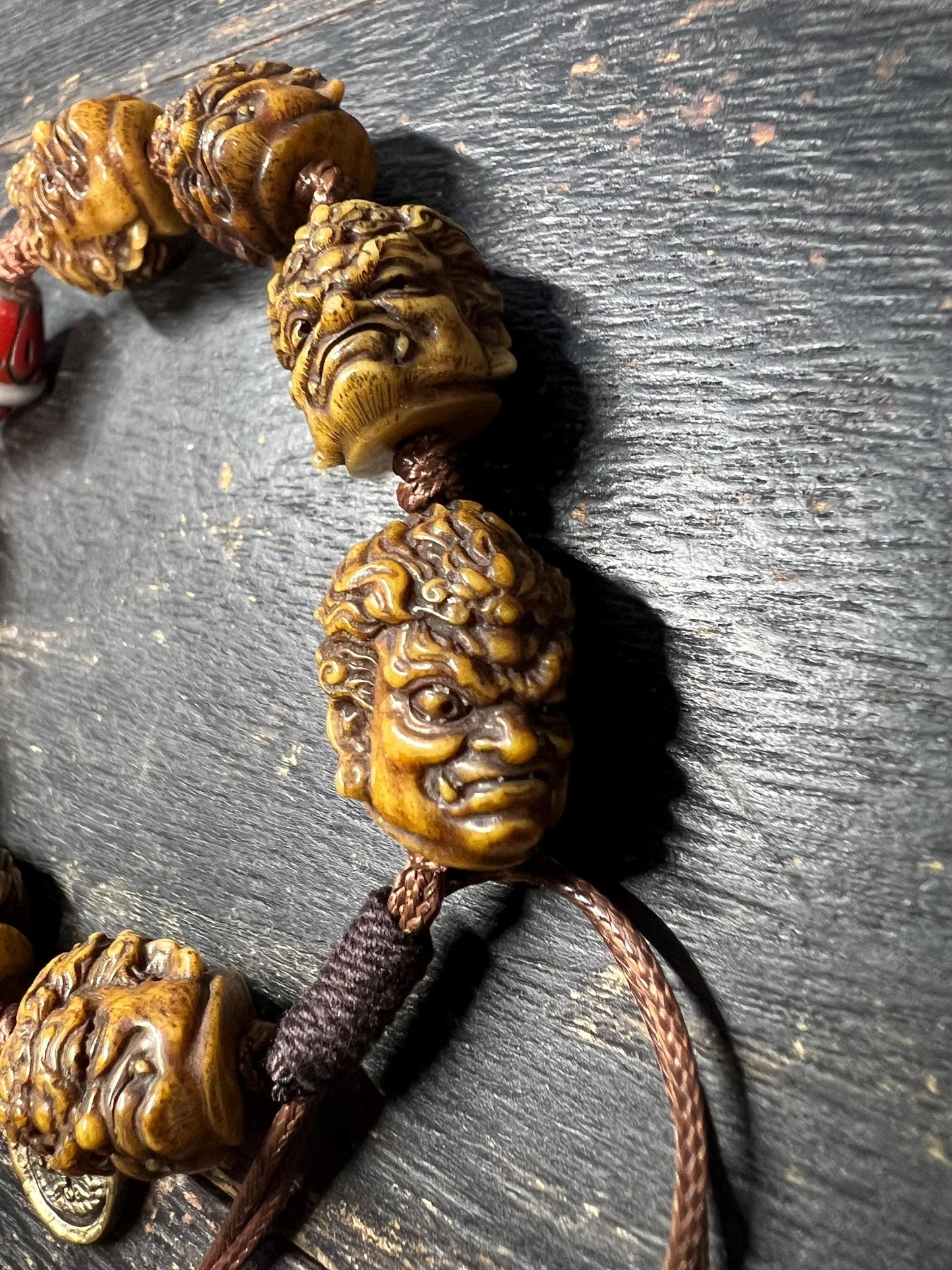 Tibetan Yak Bone Mahakala Bracelet with Coral Inlay Guru Bead | Hand‑Carved Skull Deity Heads