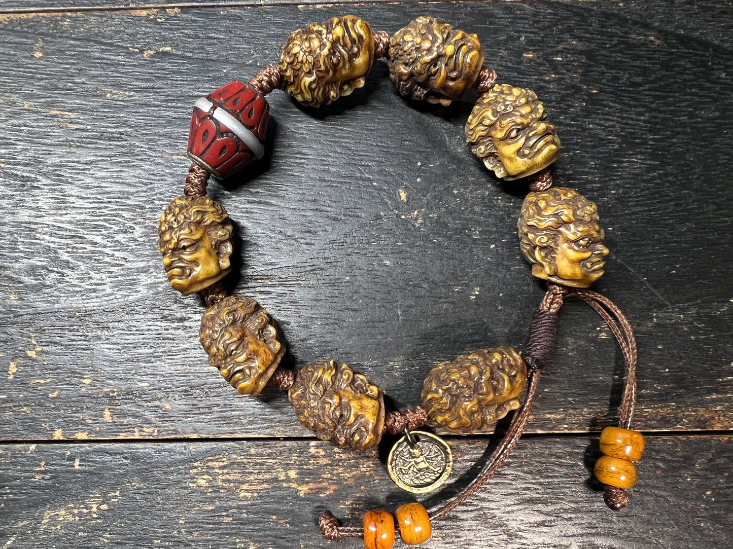 Tibetan Yak Bone Mahakala Bracelet with Coral Inlay Guru Bead | Hand‑Carved Skull Deity Heads