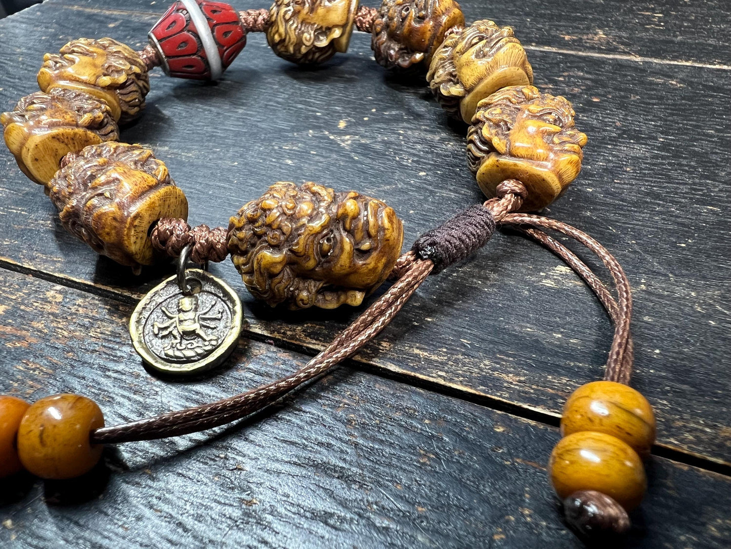 Tibetan Yak Bone Mahakala Bracelet with Coral Inlay Guru Bead | Hand‑Carved Skull Deity Heads