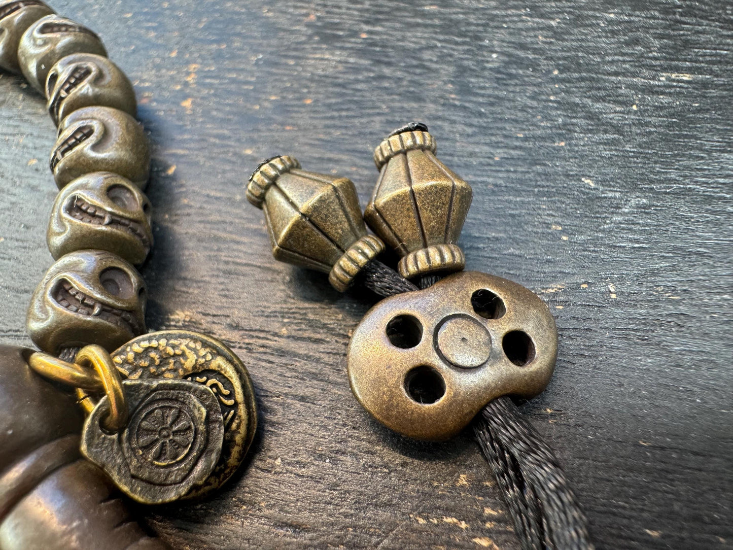 Tibetan Brass Citipati Skull Mala Bracelet | Adjustable 7-8” Wrist Prayer Beads w/ Guru Bead, Lotus Charms, Charnel Ground Amulet