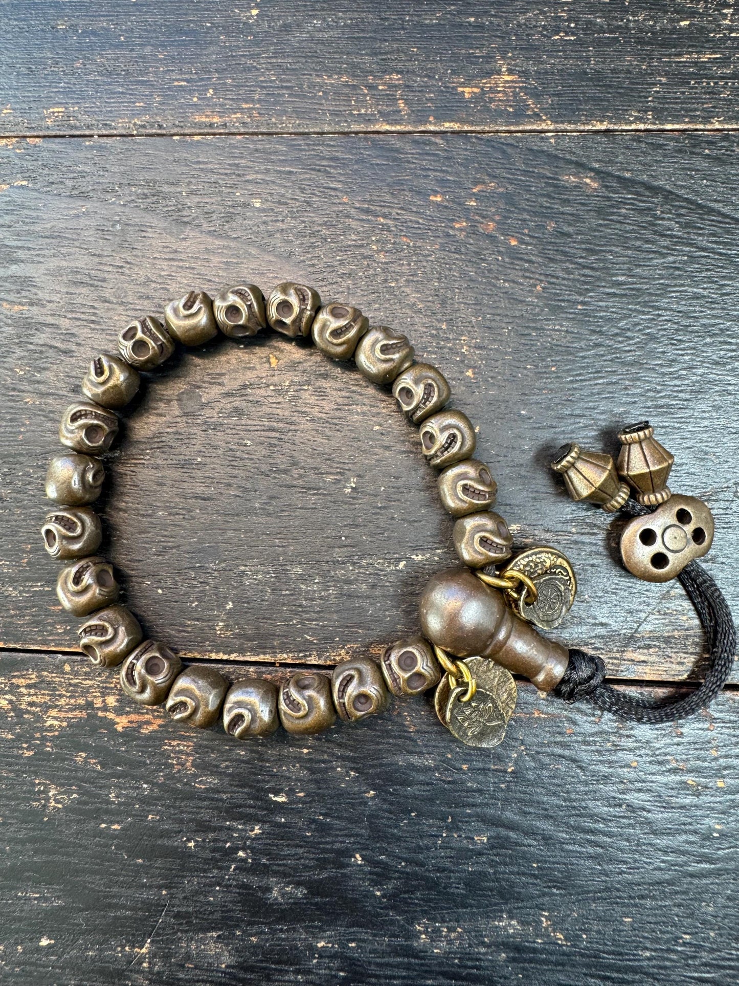 Tibetan Brass Citipati Skull Mala Bracelet | Adjustable 7-8” Wrist Prayer Beads w/ Guru Bead, Lotus Charms, Charnel Ground Amulet