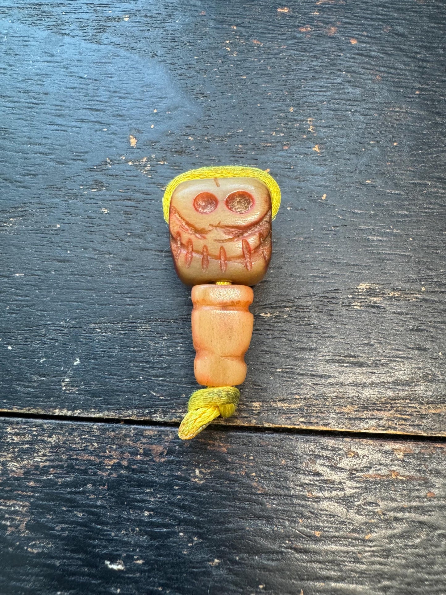 Hand‑Carved Deer Antler Cemetery Skull Guru Bead with Grasping Hand | Tibetan Charnel Ground Mala Centerpiece