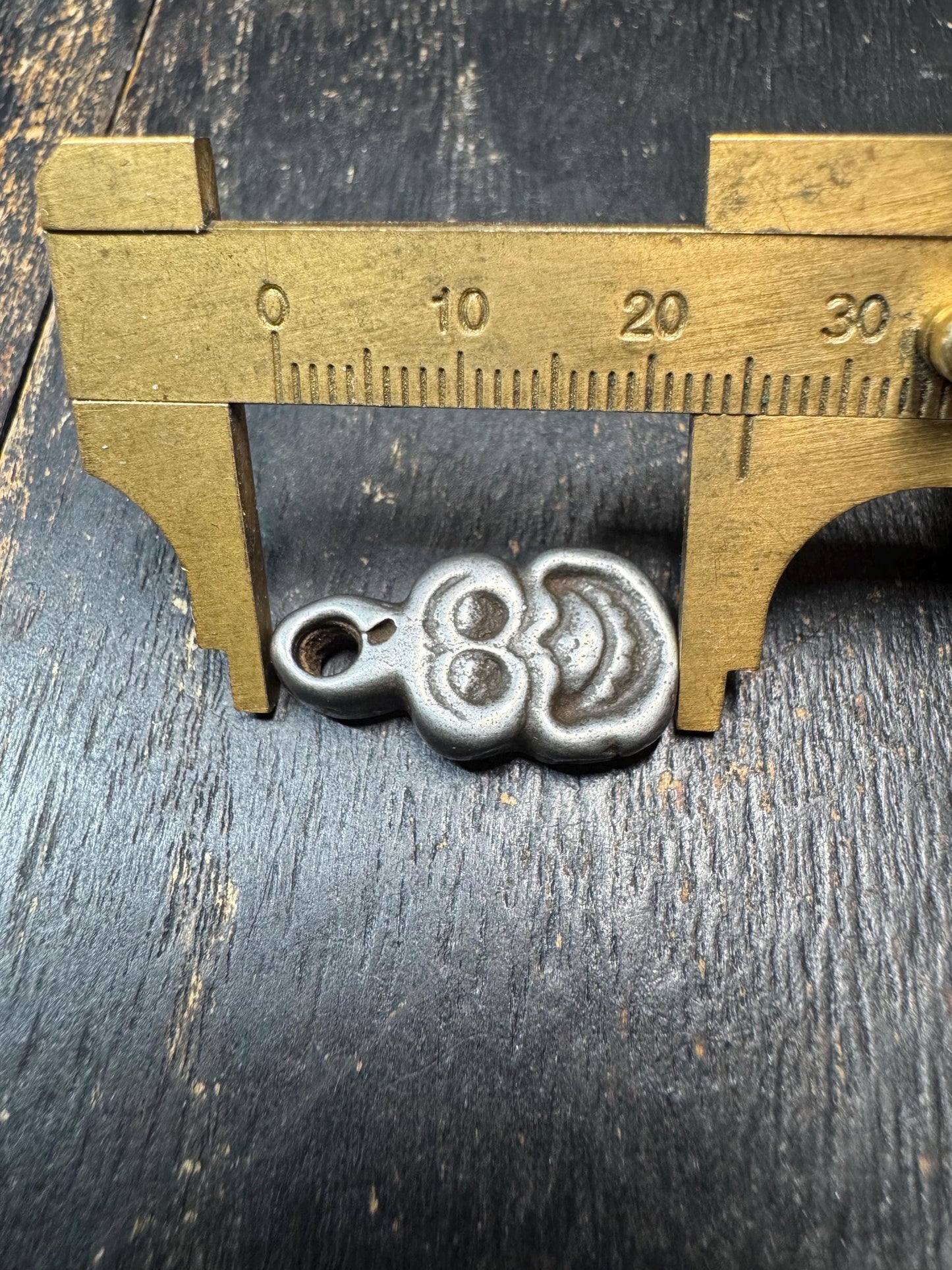 Nepalese Iron Skull Charm - Vajrayana Dharma Amulet for Spiritual Protection