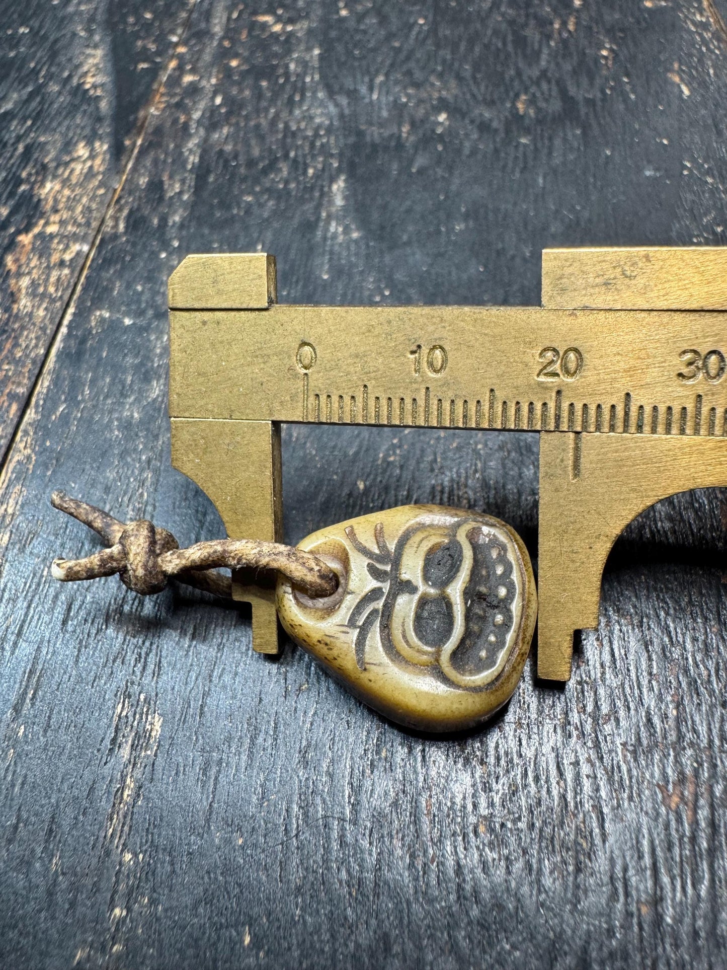 Hand Carved Yak Bone Charnel Ground Amulet with Sheepskin Cord | Tibetan Skull Spirit Pendant | Buddhist Protection Talisman | Himalayan Tri