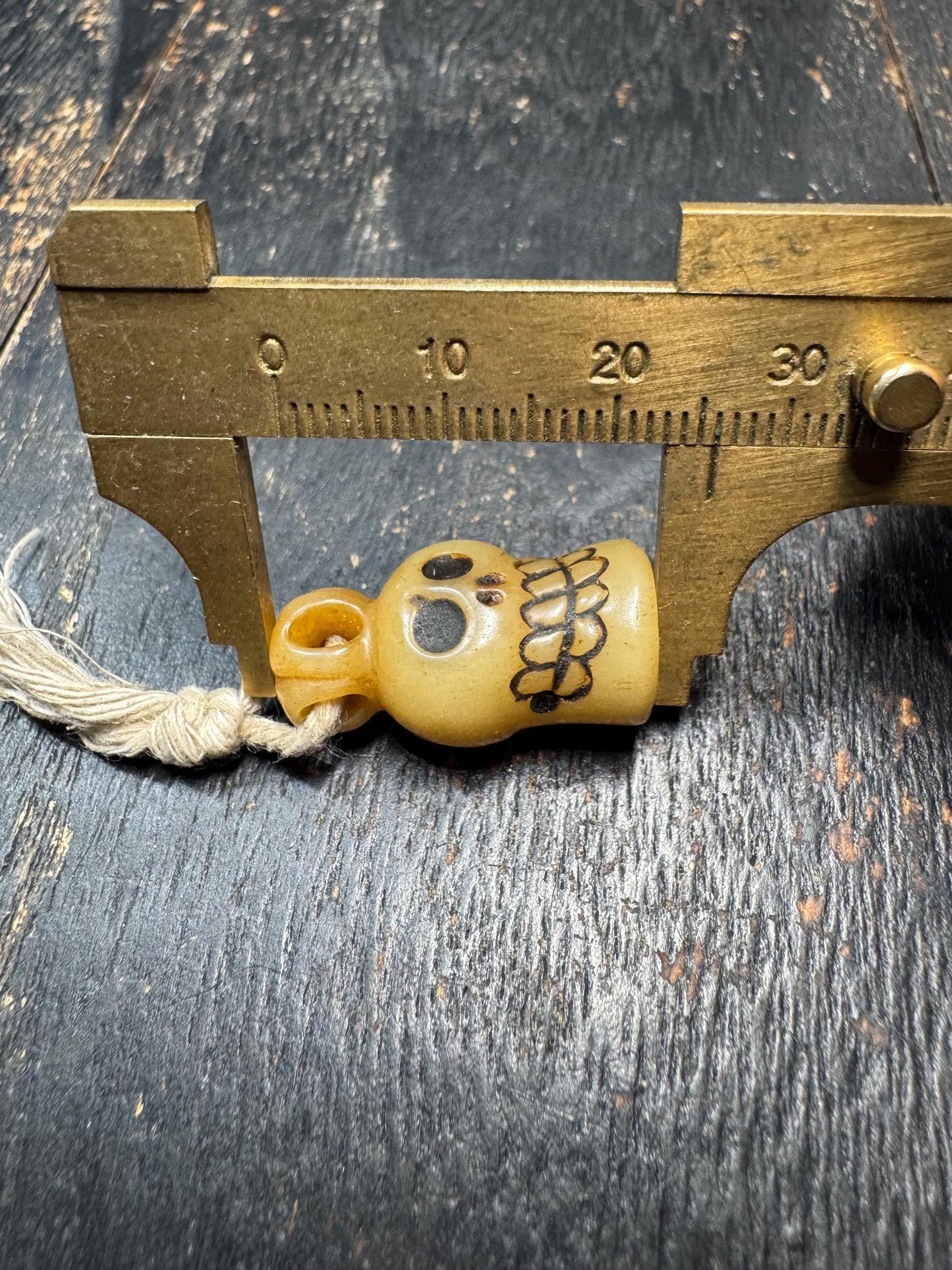 Hand Carved Yak Bone Skull Pendant – Tibetan Style Protective Amulet Charm with Natural Cord