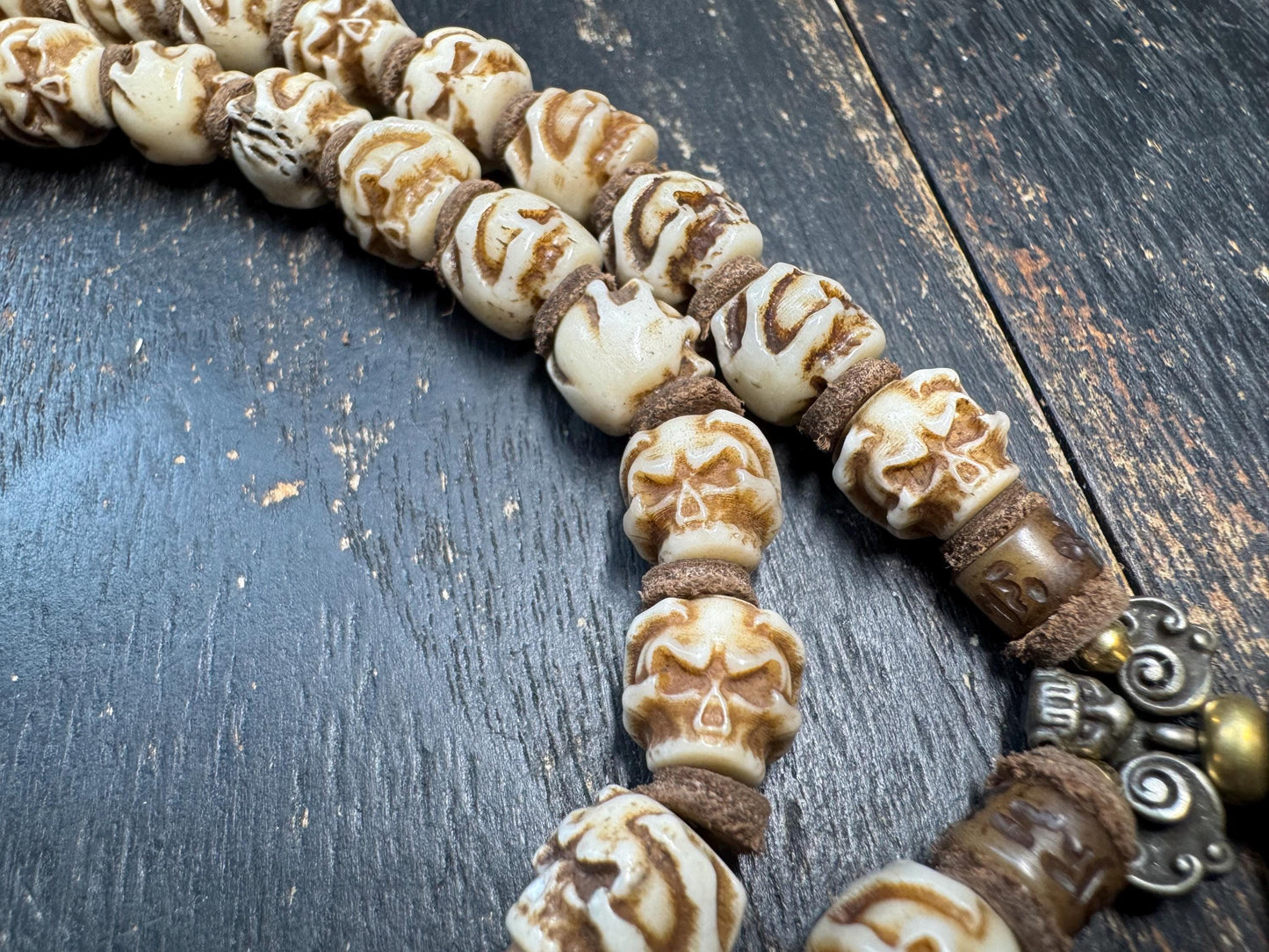 54 Bead Yak Bone Skull Mala – Hand Carved Chitipati Style Bone Necklace – 24 Inch Tibetan Inspired Meditation Mala – Sheepskin Spacers –
