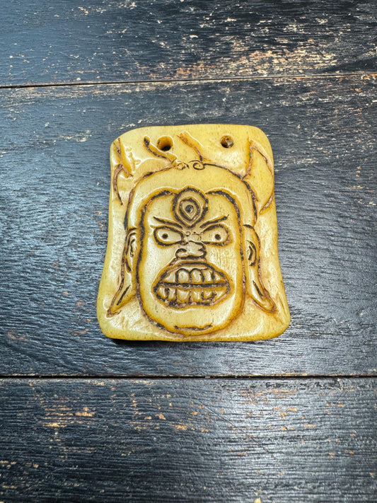 Tibetan Yak Bone Wrathful Deity Amulet – Hand Carved Protector Mask Pendant, Third Eye Talisman, Himalayan Spiritual Jewelry