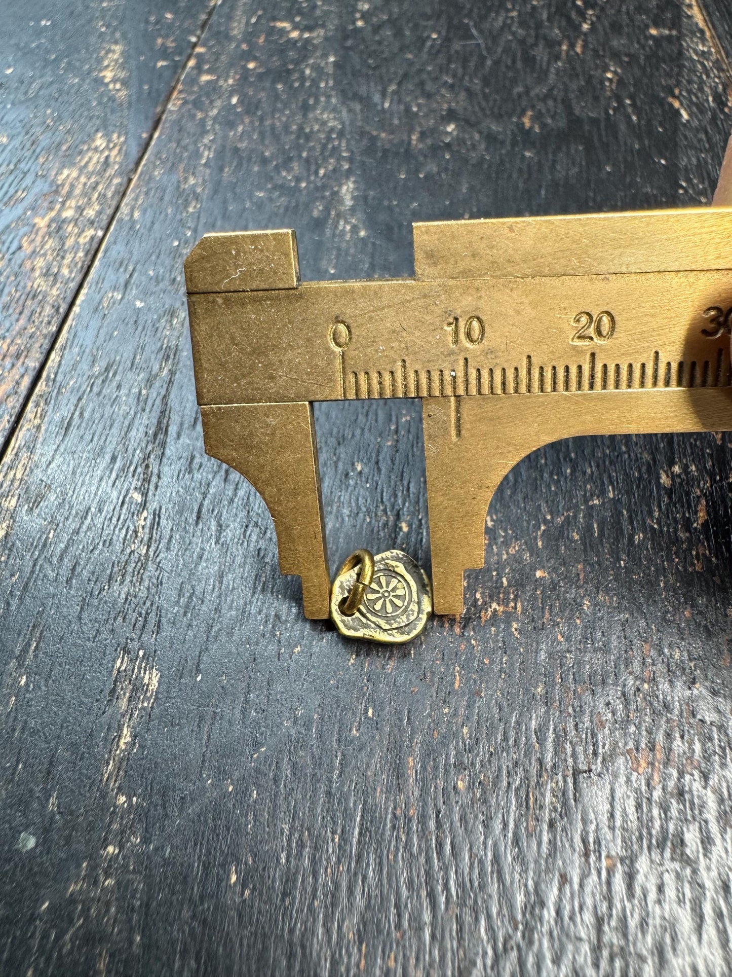 Mini Tibetan Brass Dharma Wheel Pendant – Double Sided Buddha Charm – Antique Style Small Spiritual Amulet