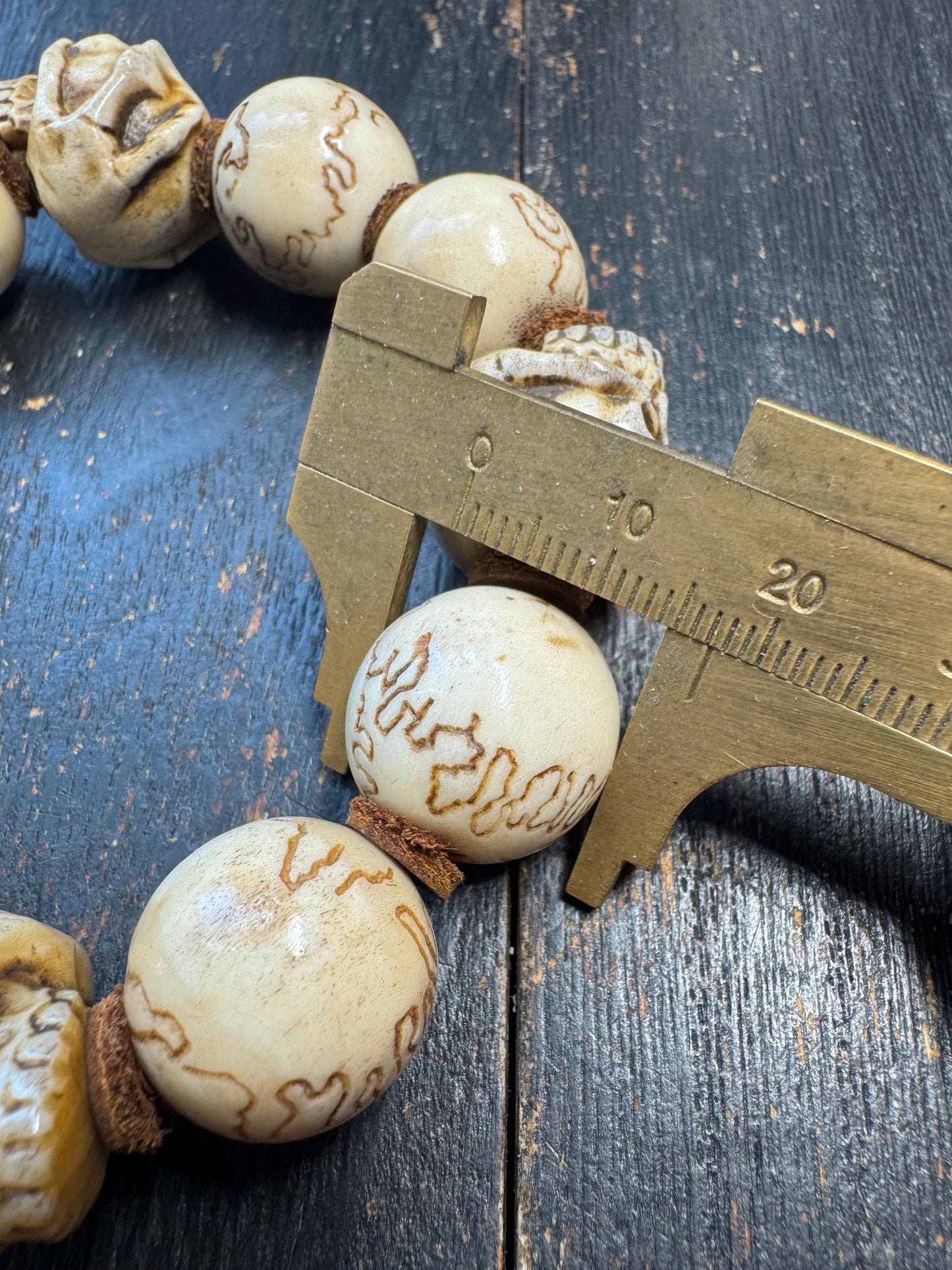 Hand Carved Deer Antler Skull Bracelet | Rustic Bone Bead Bracelet | Artisan Carved Beads | Adjustable Stretch Bracelet | One of a Kind