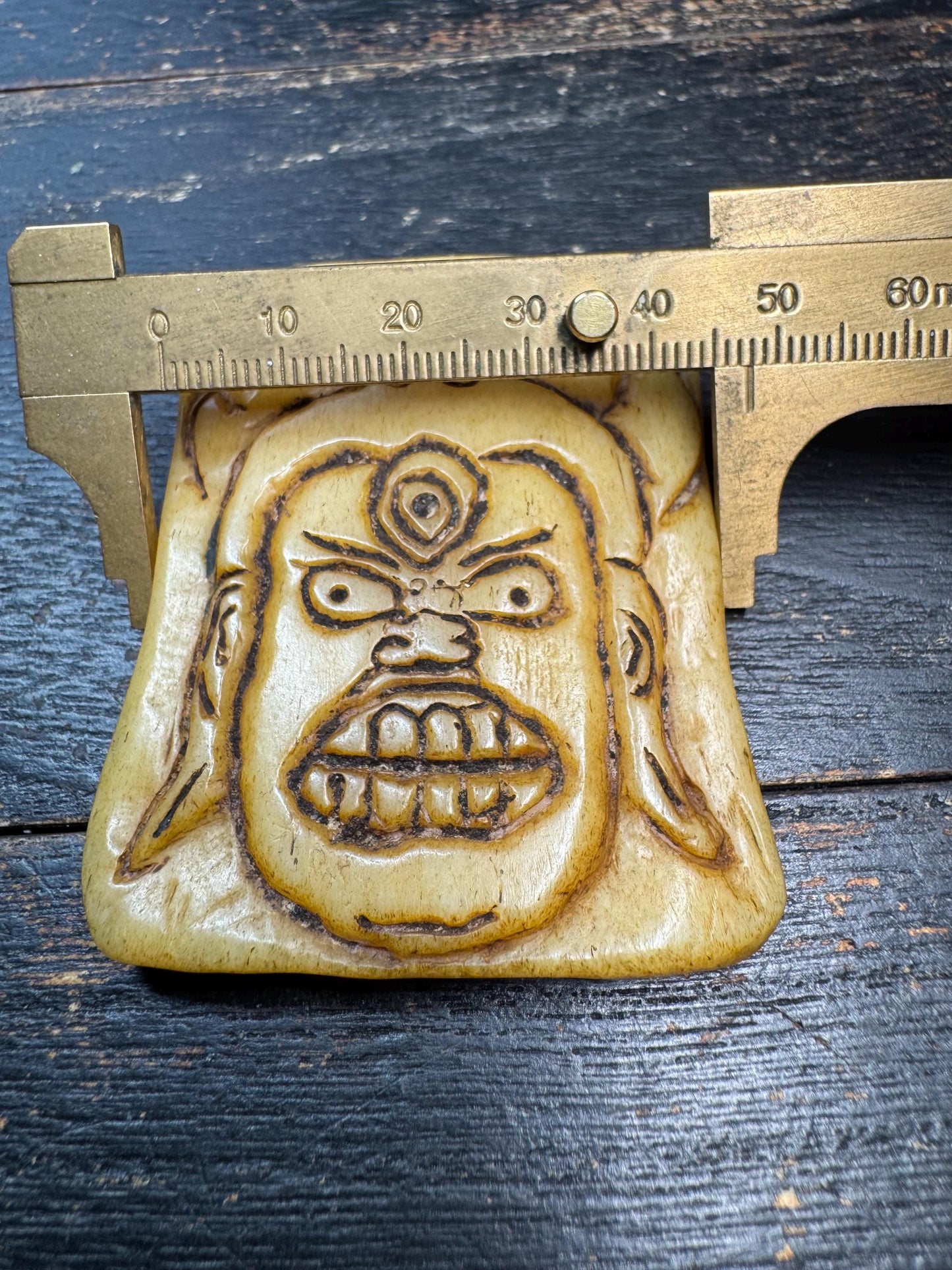 Tibetan Yak Bone Wrathful Deity Amulet – Hand Carved Protector Mask Pendant, Third Eye Talisman, Himalayan Spiritual Jewelry