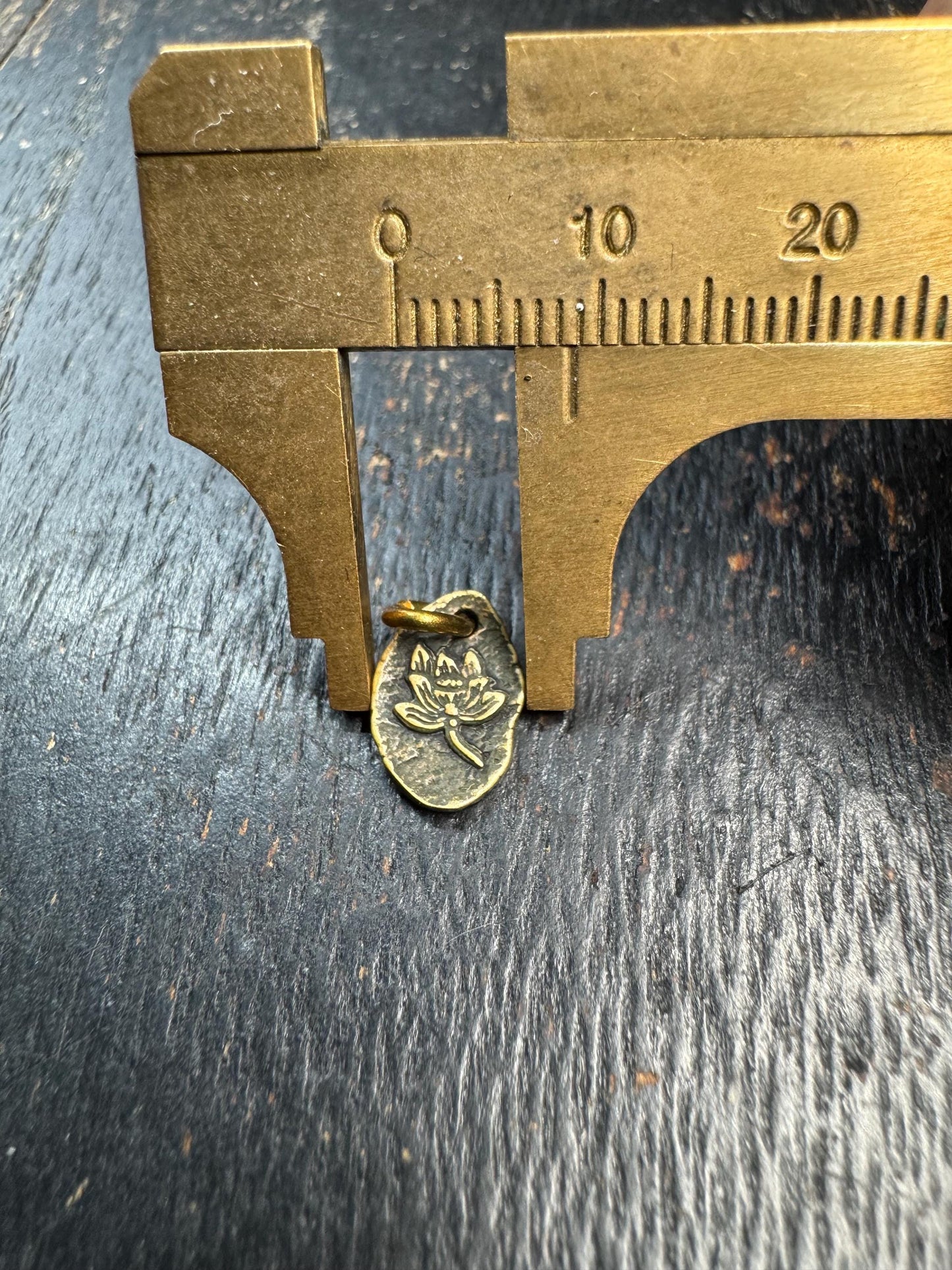 Mini Tibetan Brass Lotus Pendant – Double Sided Charm with Seed Symbol – Antique Style Small Amulet Charm