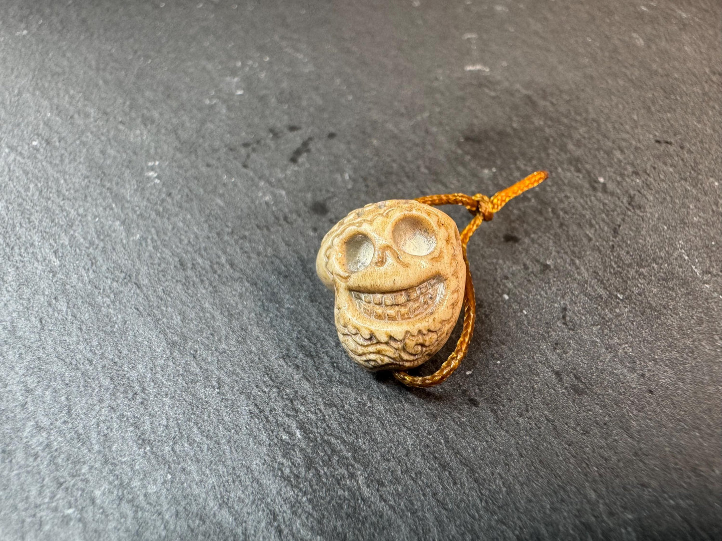 Hand Carved Deer Antler Skull Bead – Charnel Ground Style Smiling Skull Guru Bead – Tibetan Inspired Mala Pendant