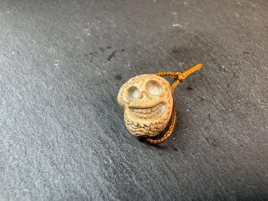 Hand Carved Deer Antler Skull Bead – Charnel Ground Style Smiling Skull Guru Bead – Tibetan Inspired Mala Pendant